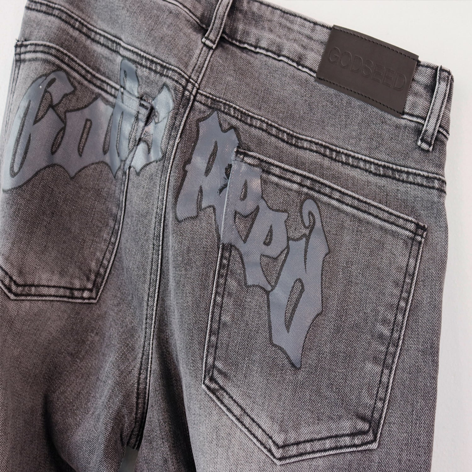 Amiri “God’s Speed” Grey Distressed Jeans