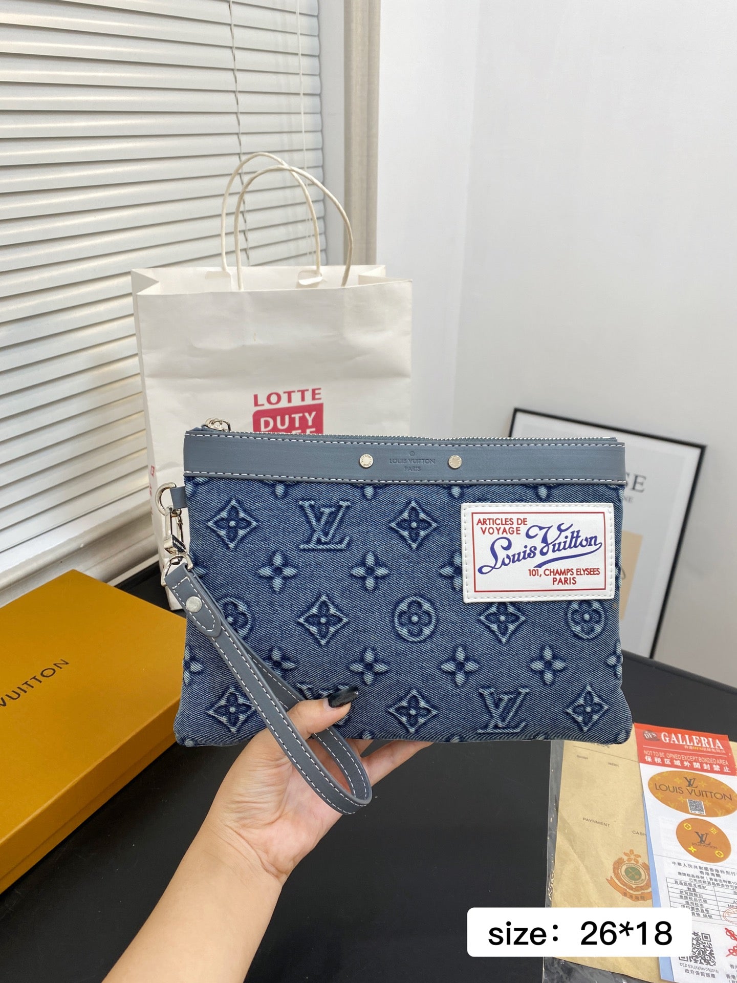 Louis Vuitton Pochette Voyage MM in Monogram Denim Blue