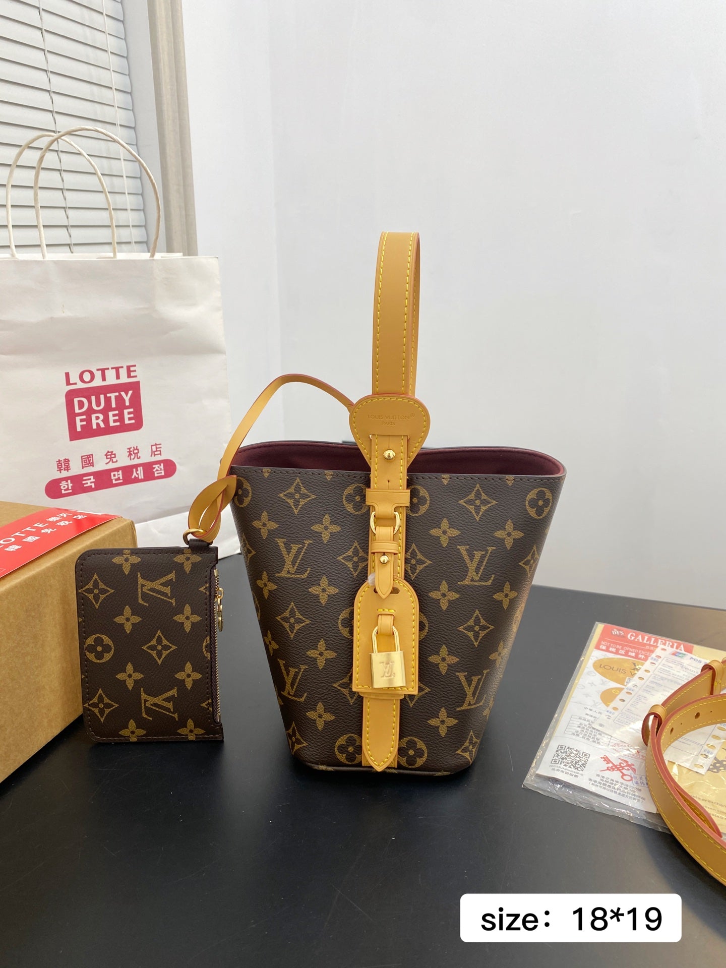 Louis Vuitton Locky BB Bucket Bag
