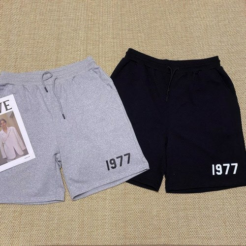 Fear of God Essentials – Grey & Black “1977” Sweat Shorts