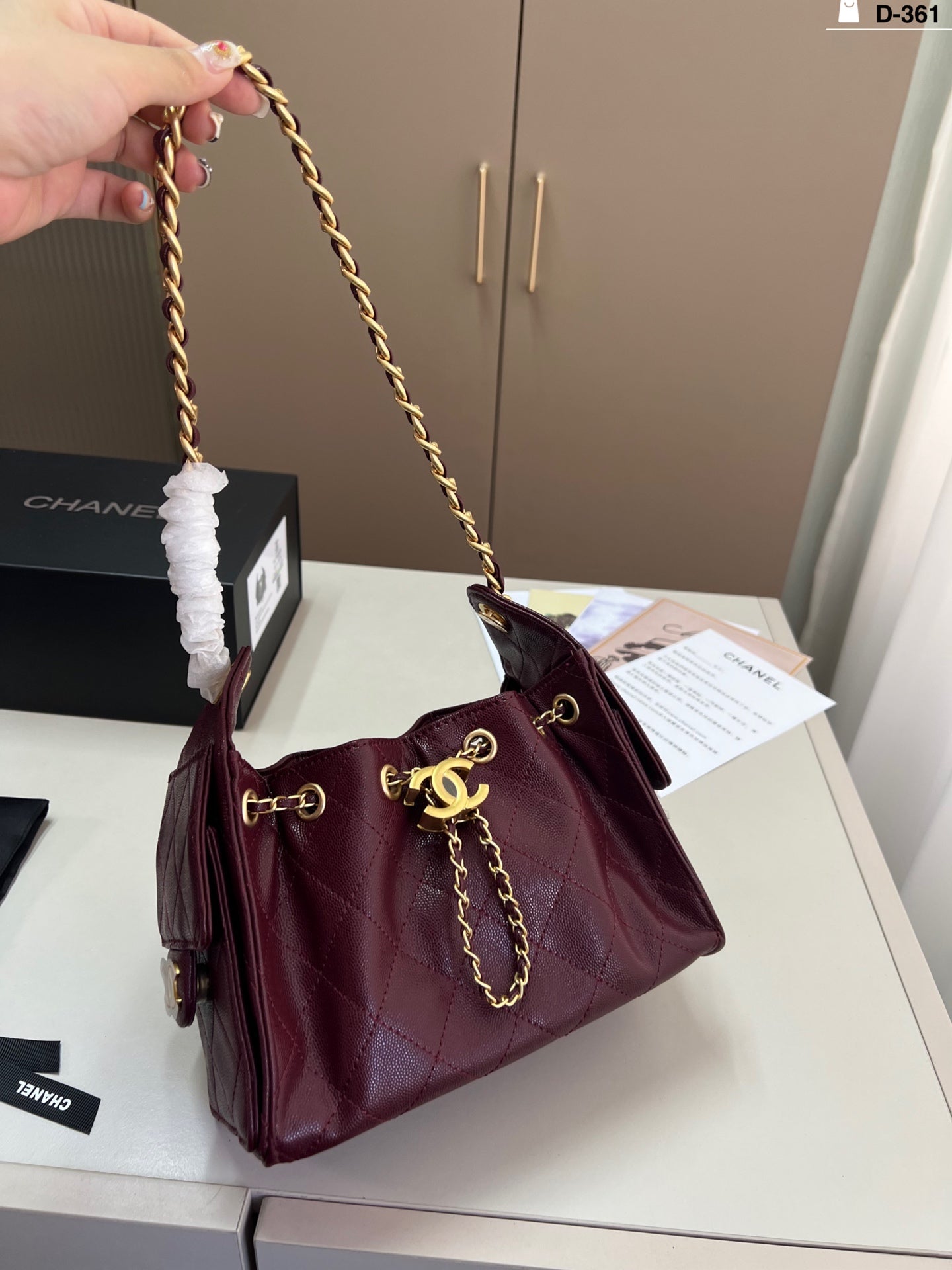 e Chanel Drawstring Bucket Bag