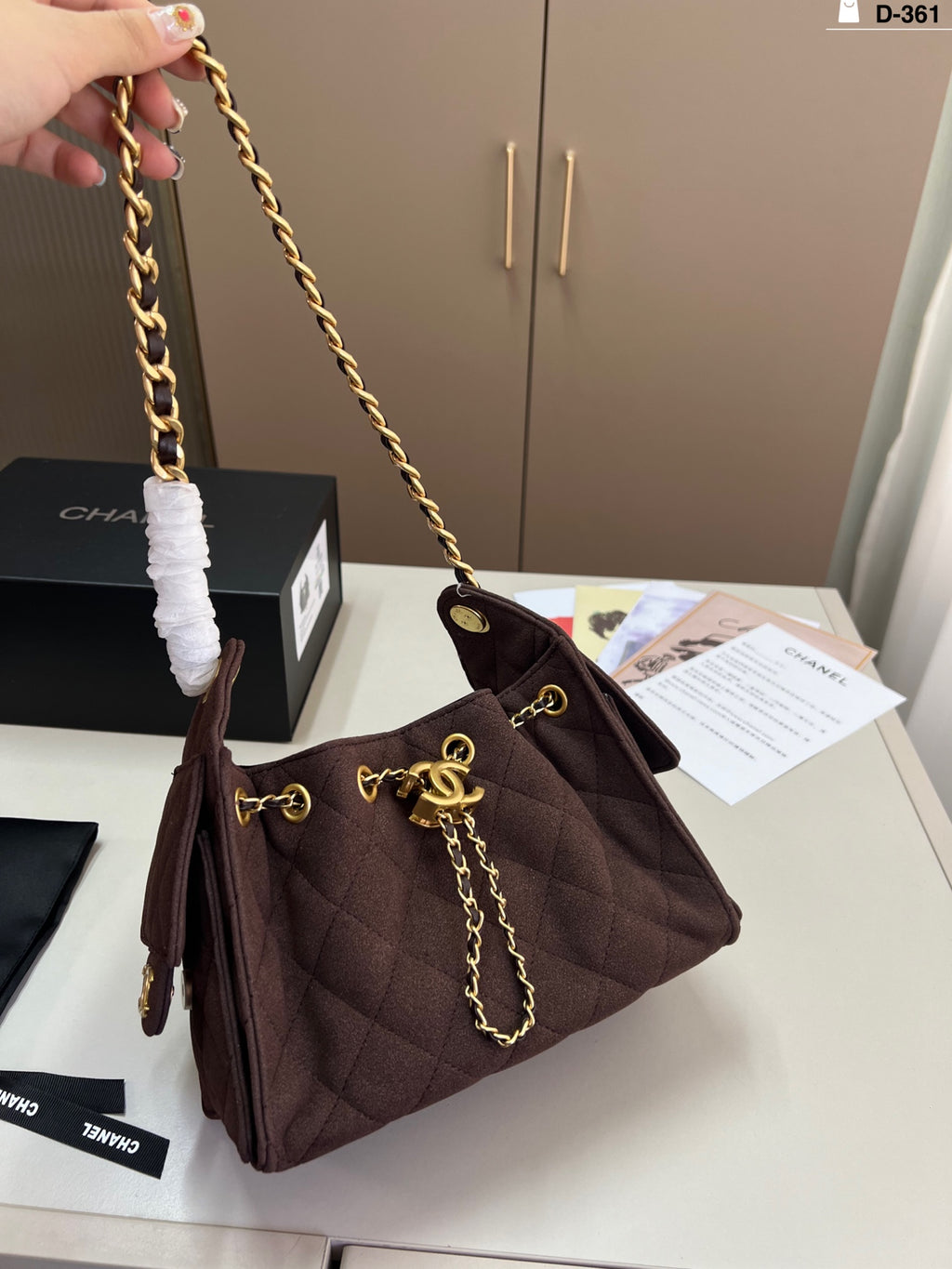 e Chanel Drawstring Bucket Bag