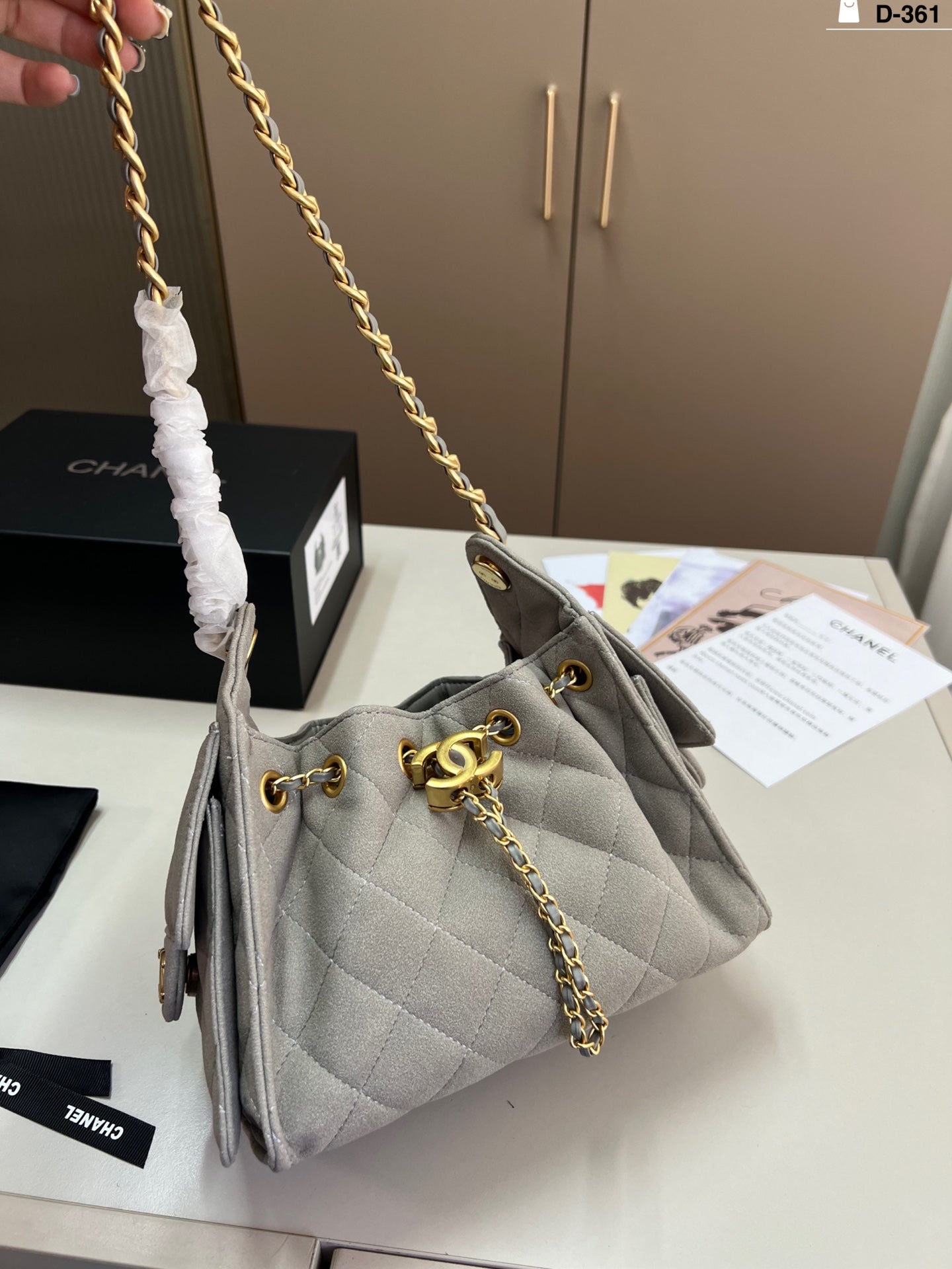 e Chanel Drawstring Bucket Bag