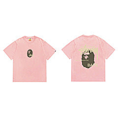 Stüssy x BAPE Ape Head Tee – Pink/Neon Green Edition